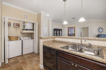 Washer/dryers in every unit - DeLayne at Twin Creeks